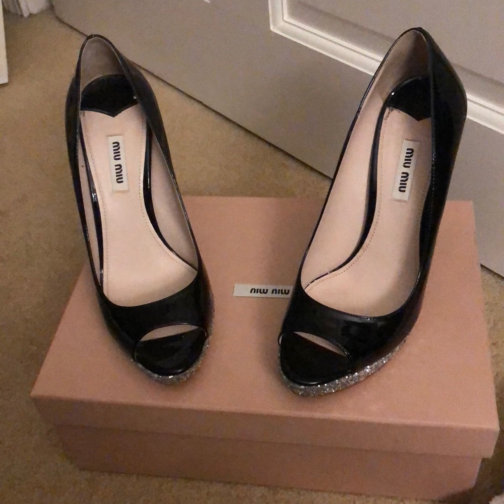 Miu Miu black patent pumps size 37.5